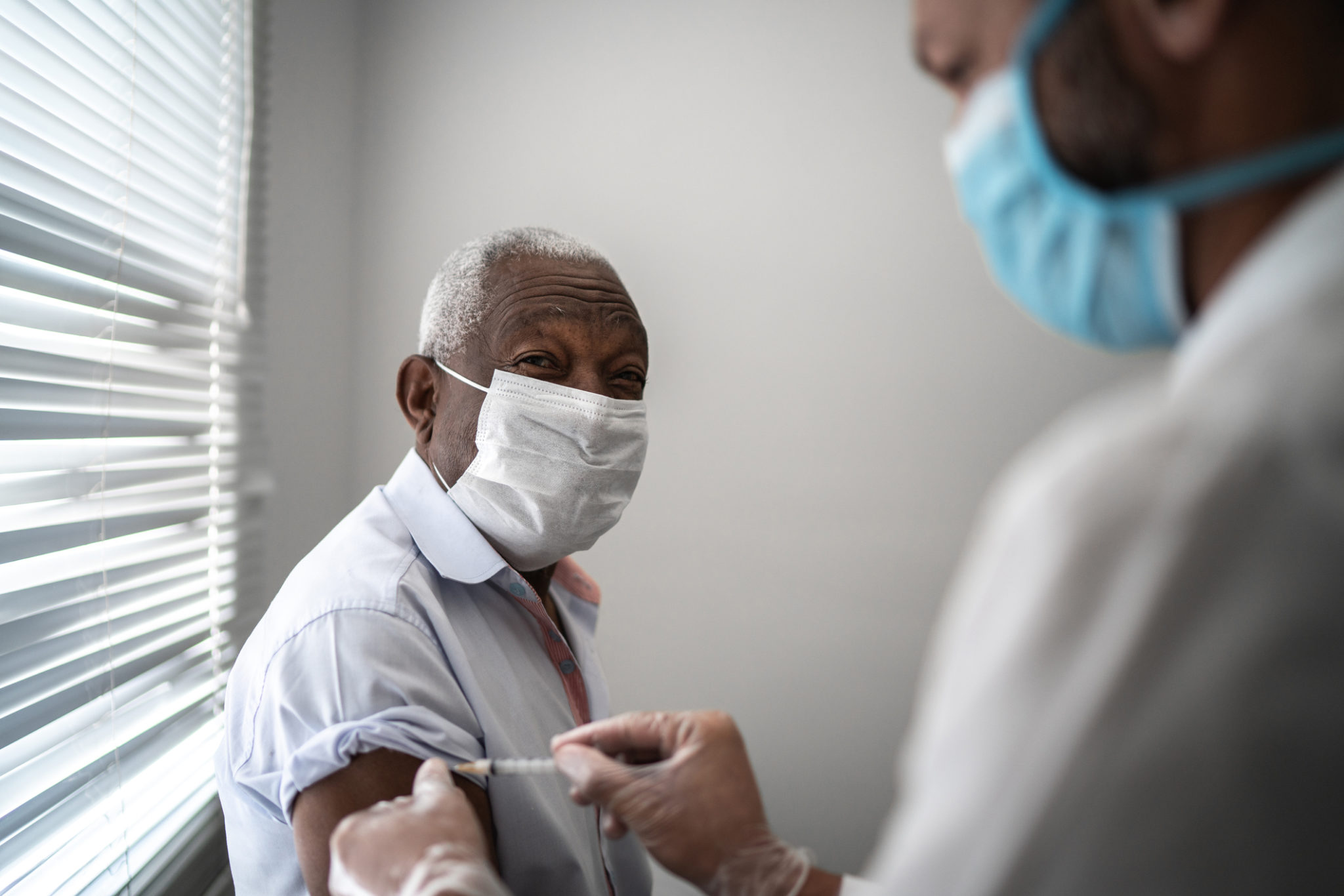 Man receiving vaccine