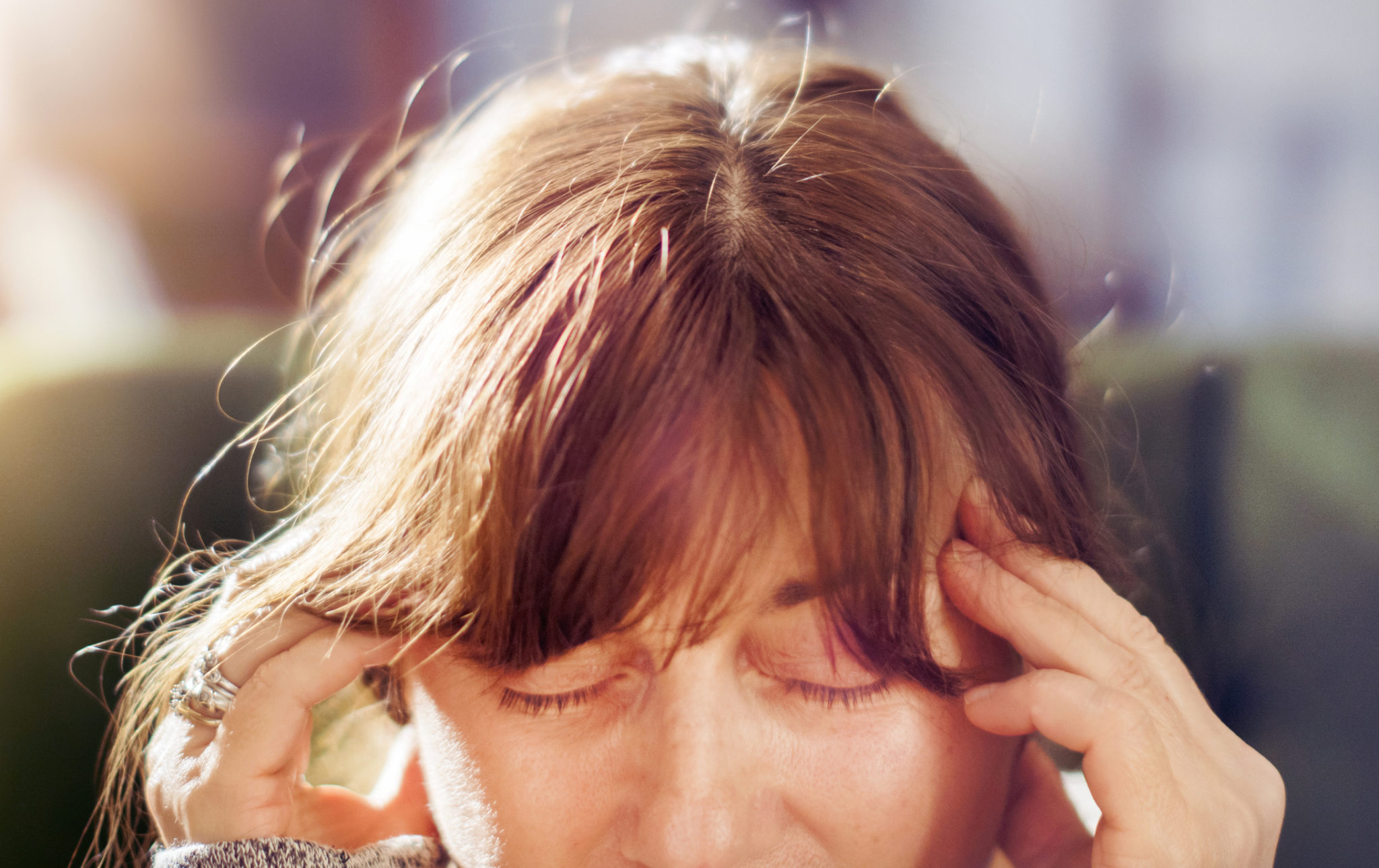 Woman with head pain