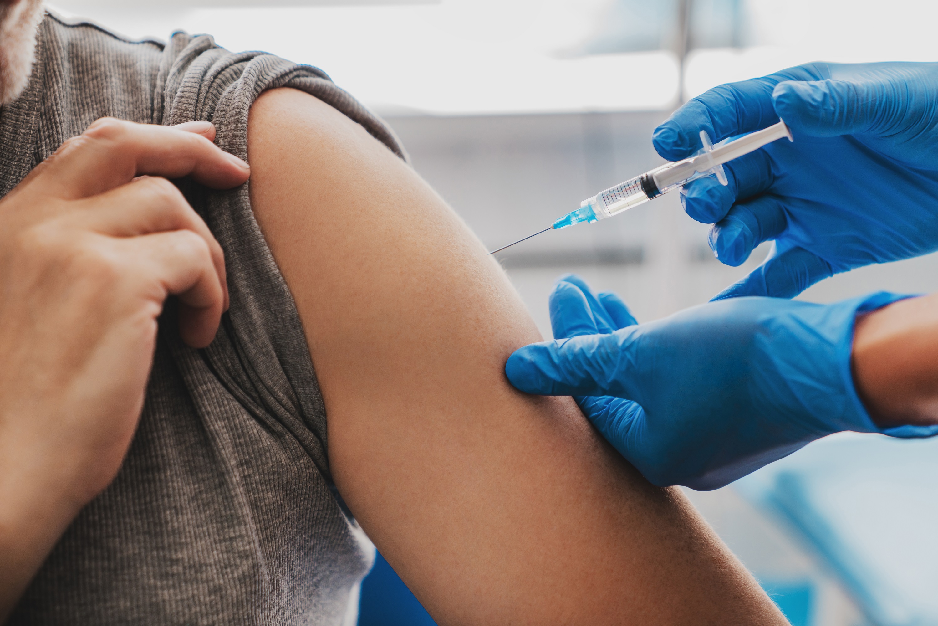 Can a booster shot make you test positive for COVID?