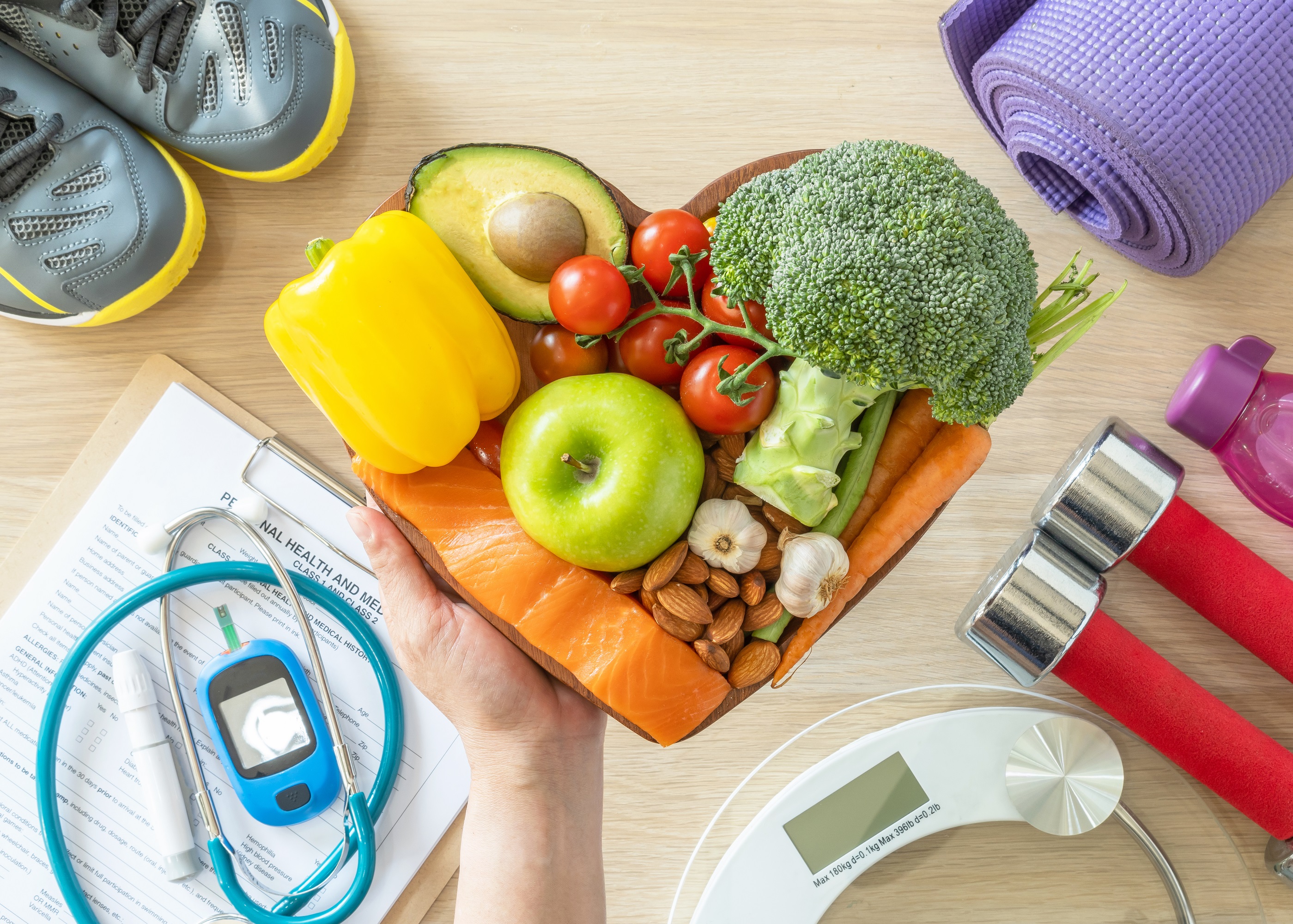 hand holding healthy foods