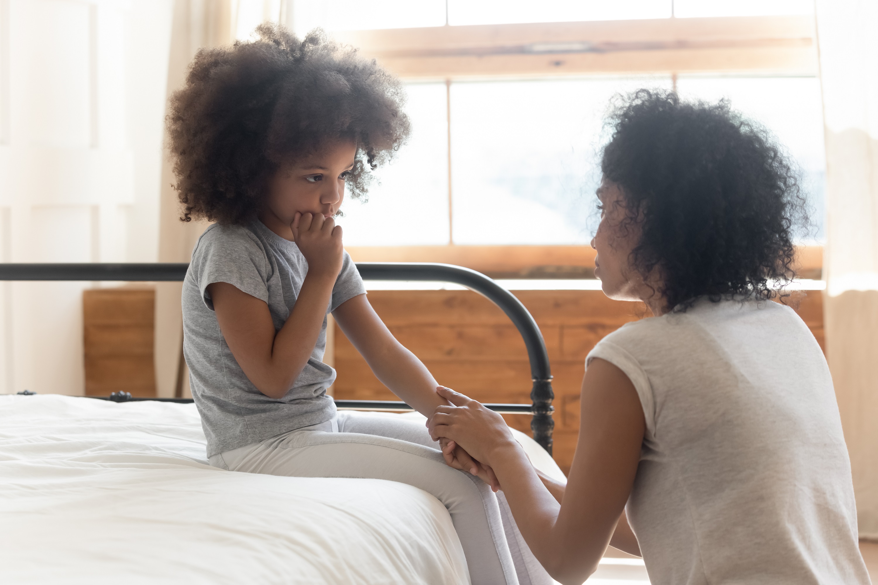 Mom talking with child