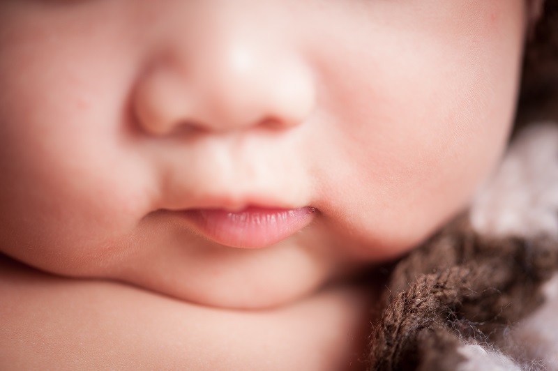 Close up of baby's mouth - concerns for lip or tongue tie