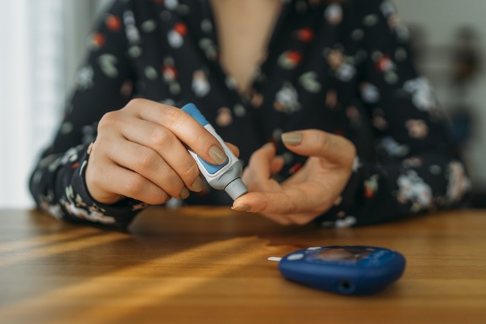 Person checking blood sugar